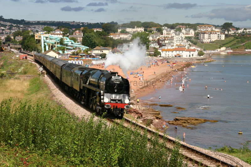 Torbay Express passing by Goodrington Sands, S. Devon